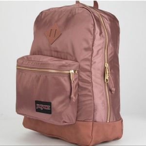 Like new rose gold Jansport back pack!
